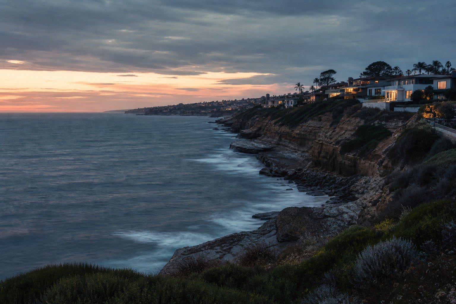 Illustrative concept image of La Jolla, San Diego coastal bluffs at dusk